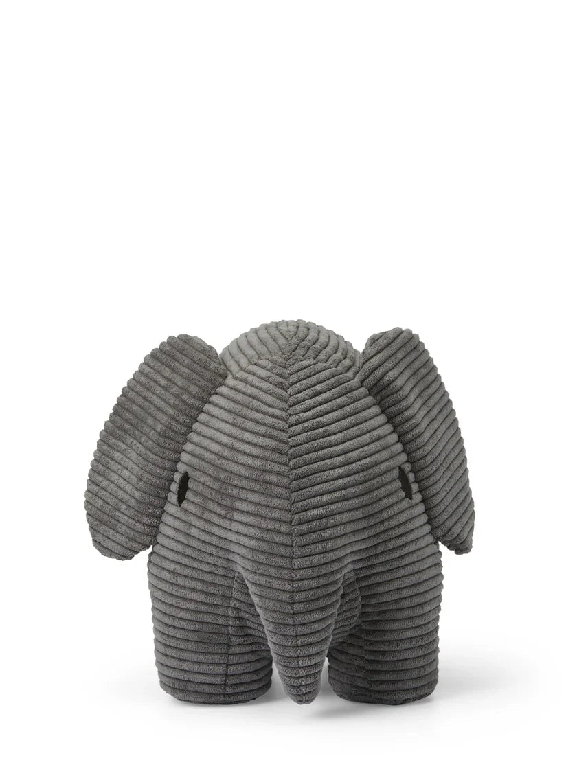 Detalle del peluche elefante de corduroy gris para bebé, textura suave